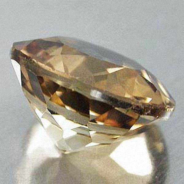 Intergemstones Golden Topas 4 60 Carat Rund VVSI Schliff Excellent